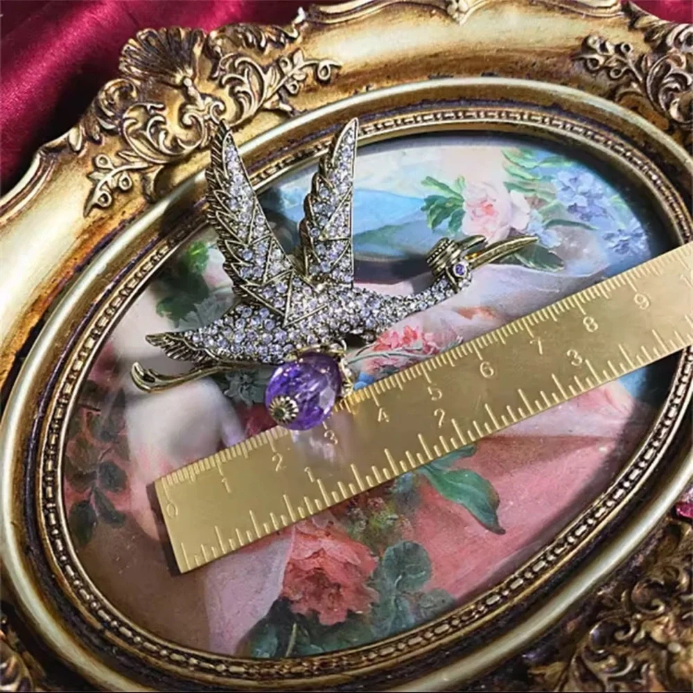 Vintage Bird in Flight Brooch with Lavender Crystal Charm